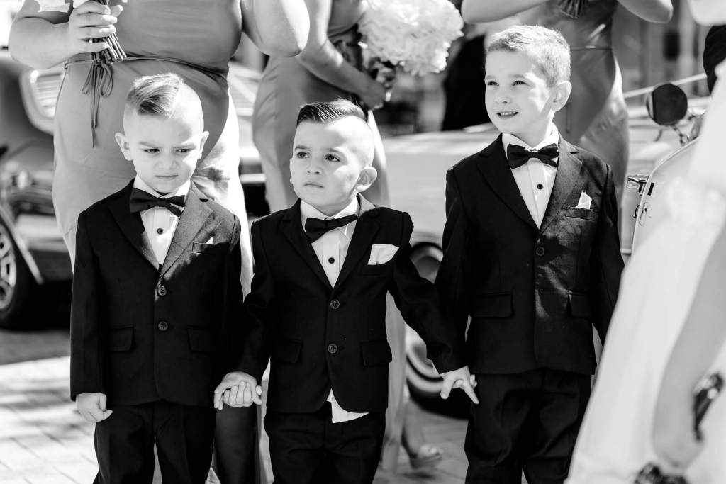 ALLSAINTS-CATHOLIC-CHURCH-LIVERPOOL-SYDNEY-WEDDING-PHOTOGRAPHY-ANELLOWEDDINGS-PAGEBOYS-HOLDING-HANDS