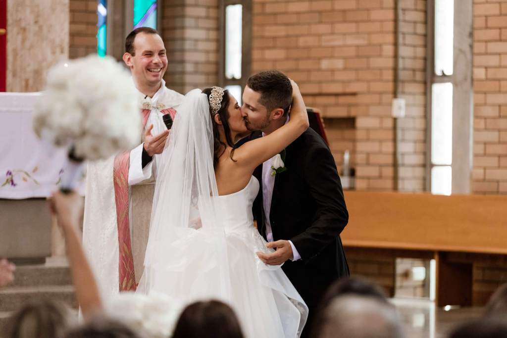 ALLSAINTS-CATHOLIC-CHURCH-LIVERPOOL-SYDNEY-WEDDING-PHOTOGRAPHY-ANELLOWEDDINGS-FIRST-KISS