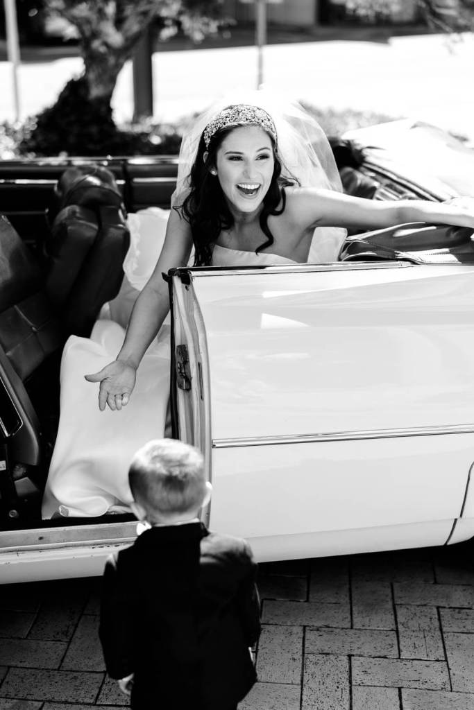 ALLSAINTS-CATHOLIC-CHURCH-LIVERPOOL-SYDNEY-WEDDING-PHOTOGRAPHY-ANELLOWEDDINGS-BRIDE-IN-HIRE-CAR