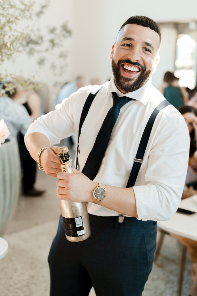 PECA-RESTARAUNT-GLEDSWOOD-HILLS-ENGAGEMENT-LOCATION-ANELLOWEDDINGS-PECA-RESTARAUNT-GLEDSWOOD-HILLS-ENGAGEMENT-LOCATION-ANELLOWEDDINGS-BROTHER-POPPING-BOTTLES-MOET