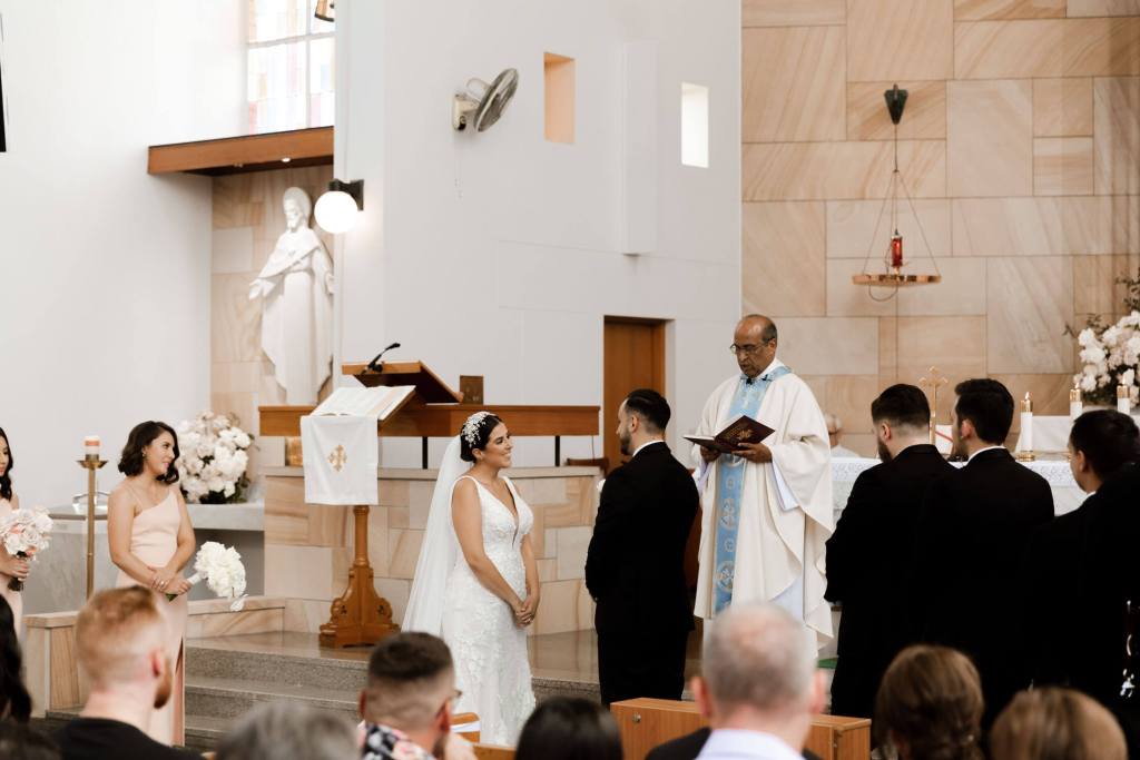 ST-PETER-CHANEL-CATHOLIC-CHURCH-BERALA-SYDNEY-WEDDING-PHOTOGRAPHER-ANELLOWEDDINGS-AT-THE-ALTER