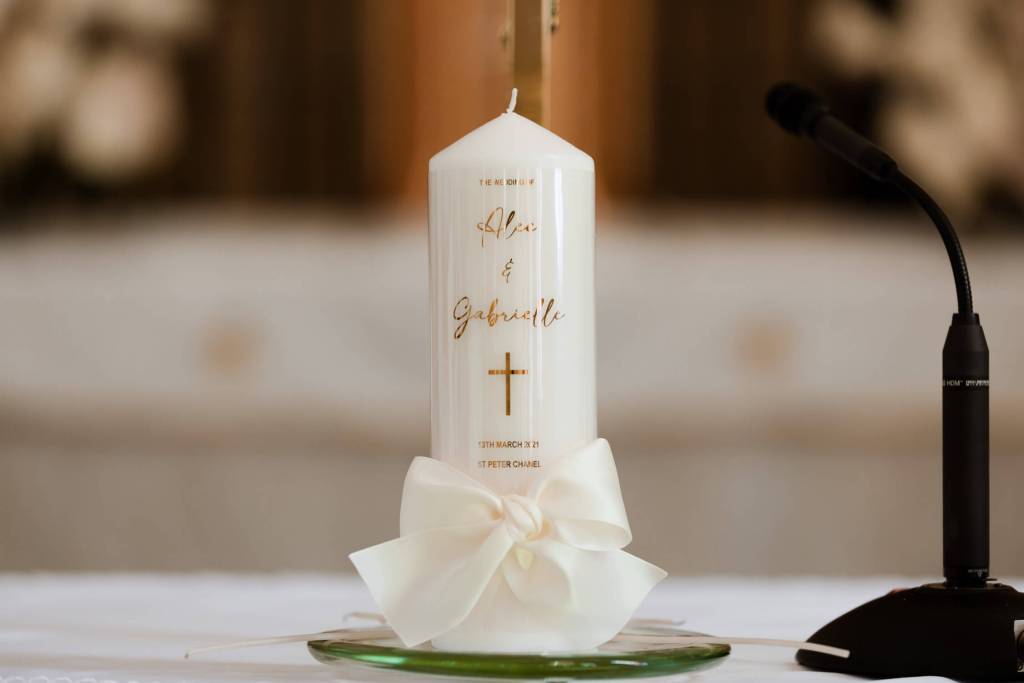 ST-PETER-CHANEL-CATHOLIC-CHURCH-BERALA-SYDNEY-WEDDING-PHOTOGRAPHER-ANELLOWEDDINGS-CATHOLIC-CANDLE