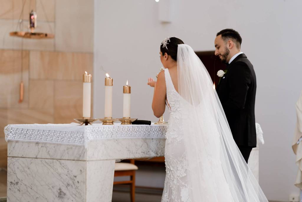 ST-PETER-CHANEL-CATHOLIC-CHURCH-BERALA-SYDNEY-WEDDING-PHOTOGRAPHER-ANELLOWEDDINGS-CATHOLIC-CANDLES