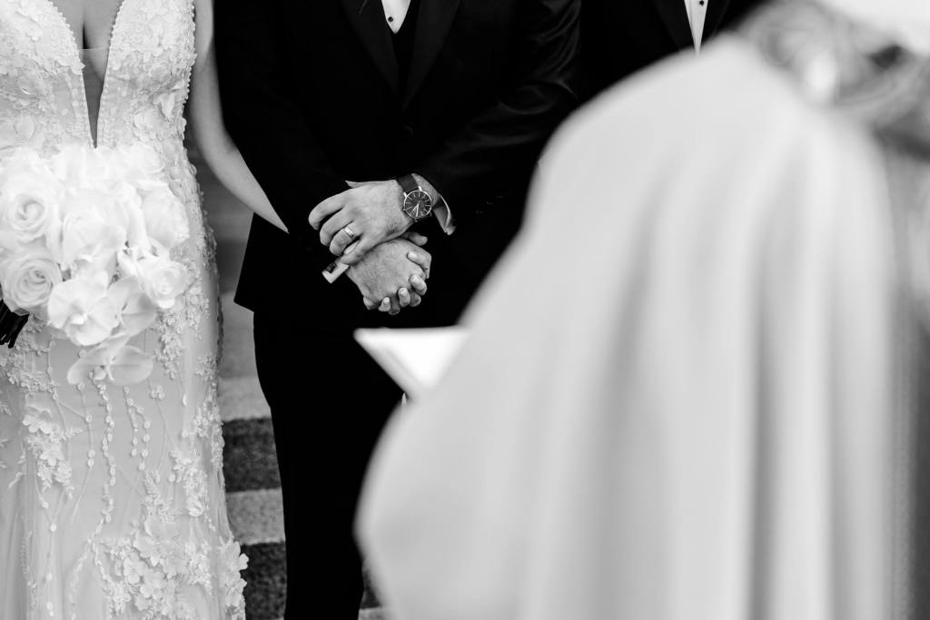 ST-PETER-CHANEL-CATHOLIC-CHURCH-BERALA-SYDNEY-WEDDING-PHOTOGRAPHER-ANELLOWEDDINGS-HOLDING-HANDS