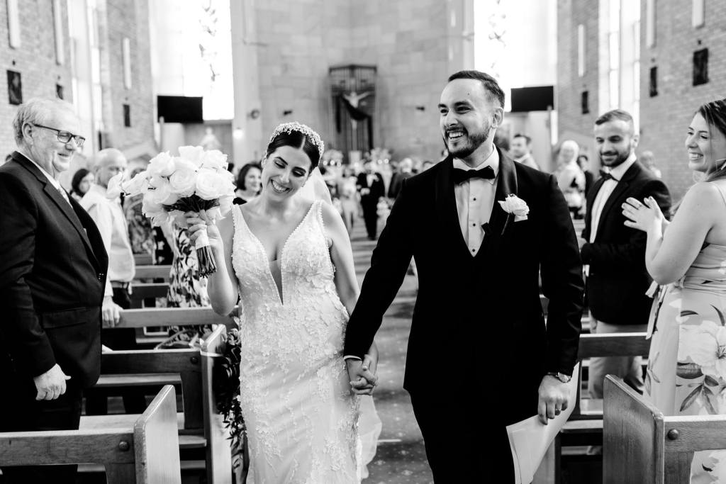 ST-PETER-CHANEL-CATHOLIC-CHURCH-BERALA-SYDNEY-WEDDING-PHOTOGRAPHER-ANELLOWEDDINGS-ALTER-BRIDE-AND-GROOM