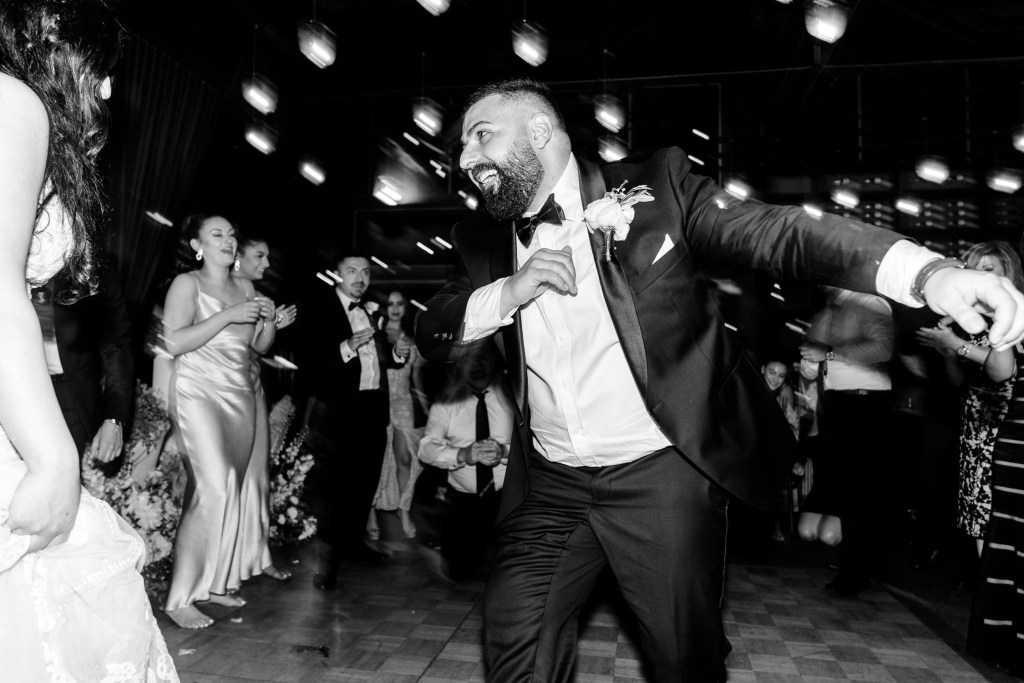 VIEW-BY-SYDNEY-PIER-ONE-WEDDING-PHOTOGRAPHER-ANELLOWEDDINGS-WEDDING-GUEST-DANCING-PHOTOS