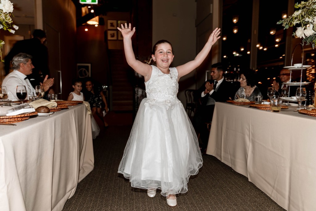 VIEW-BY-SYDNEY-PIER-ONE-WEDDING-PHOTOGRAPHER-ANELLOWEDDINGS-FLOWER-GIRL-ENTRANCE