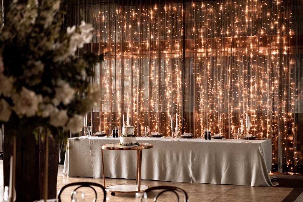 VIEW-BY-SYDNEY-PIER-ONE-WEDDING-PHOTOGRAPHER-ANELLOWEDDINGS-FAIRY-LIGHT-WALL