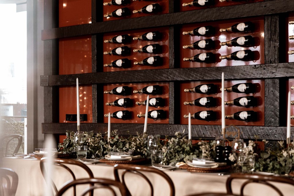 VIEW-BY-SYDNEY-PIER-ONE-WEDDING-PHOTOGRAPHER-ANELLOWEDDINGS-WINE-WALL