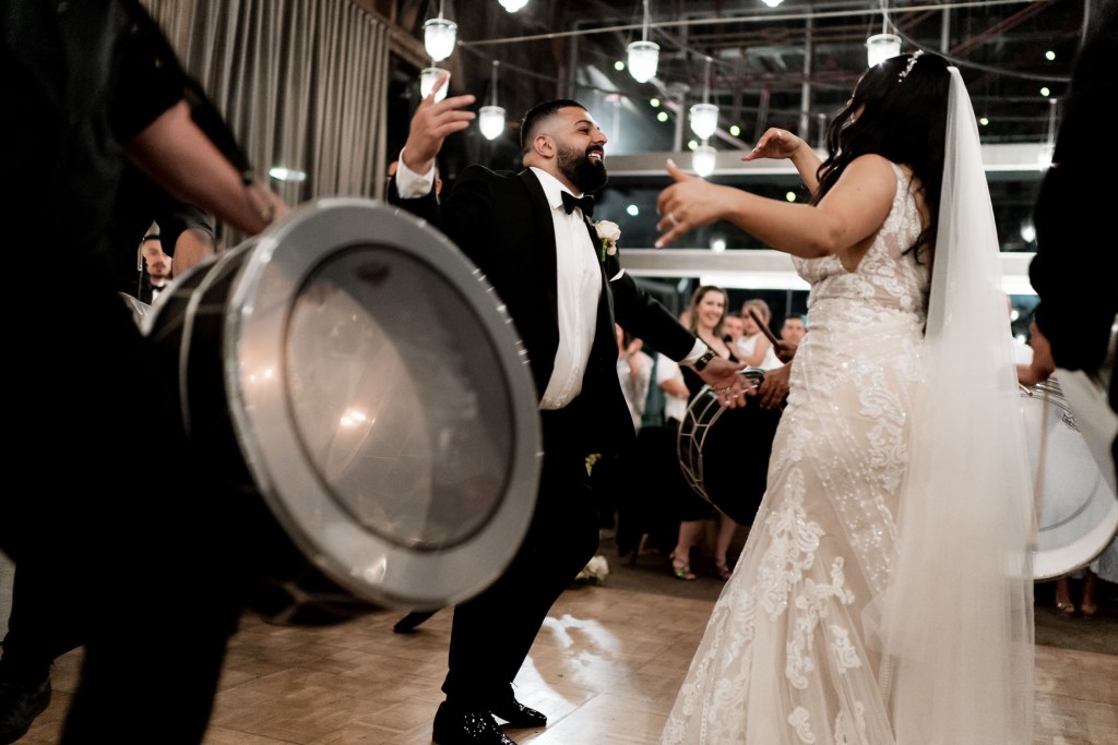 VIEW-BY-SYDNEY-PIER-ONE-WEDDING-PHOTOGRAPHER-ANELLOWEDDINGS-BRIDE-AND-GROOM-ENTRANCE-DANCE-SONGS