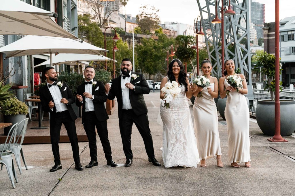VIEW-BY-SYDNEY-PIER-ONE-WEDDING-PHOTOGRAPHER-ANELLOWEDDINGS-BRIDAL-PARTY-DANCE-FUN