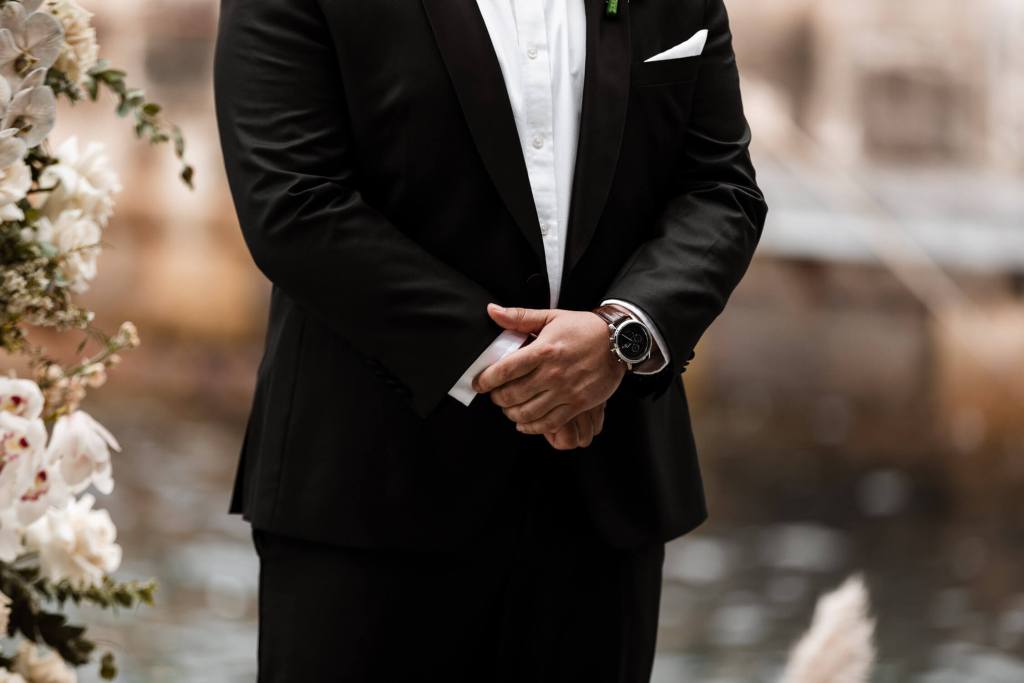 VIEW-BY-SYDNEY-PIER-ONE-WEDDING-PHOTOGRAPHER-ANELLOWEDDINGS-NERVOUS-GROOM-AT-ALTER
