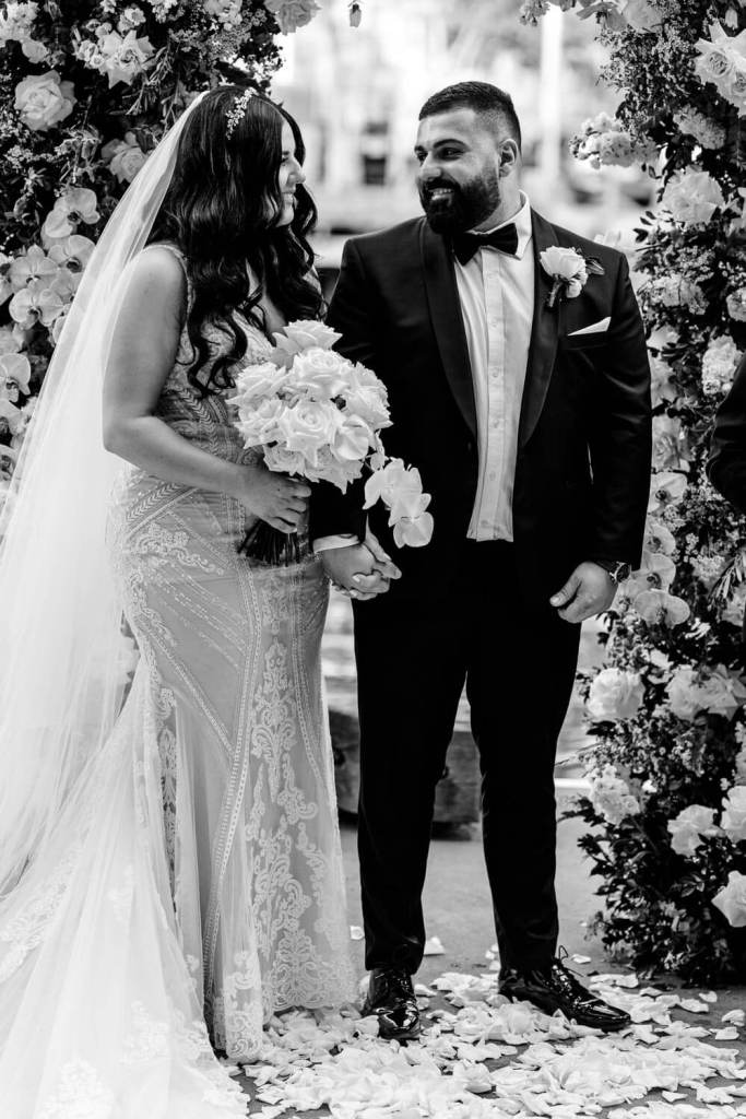 VIEW-BY-SYDNEY-PIER-ONE-WEDDING-PHOTOGRAPHER-ANELLOWEDDINGS-SMILING-COUPLE
