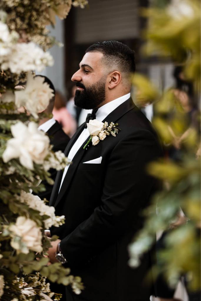VIEW-BY-SYDNEY-PIER-ONE-WEDDING-PHOTOGRAPHER-ANELLOWEDDINGS-NERVOUS-GROOM-AT-ALTER