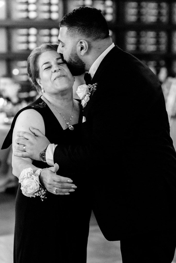 VIEW-BY-SYDNEY-PIER-ONE-WEDDING-PHOTOGRAPHER-ANELLOWEDDINGS-SON-AND-MOTHER-DANCE