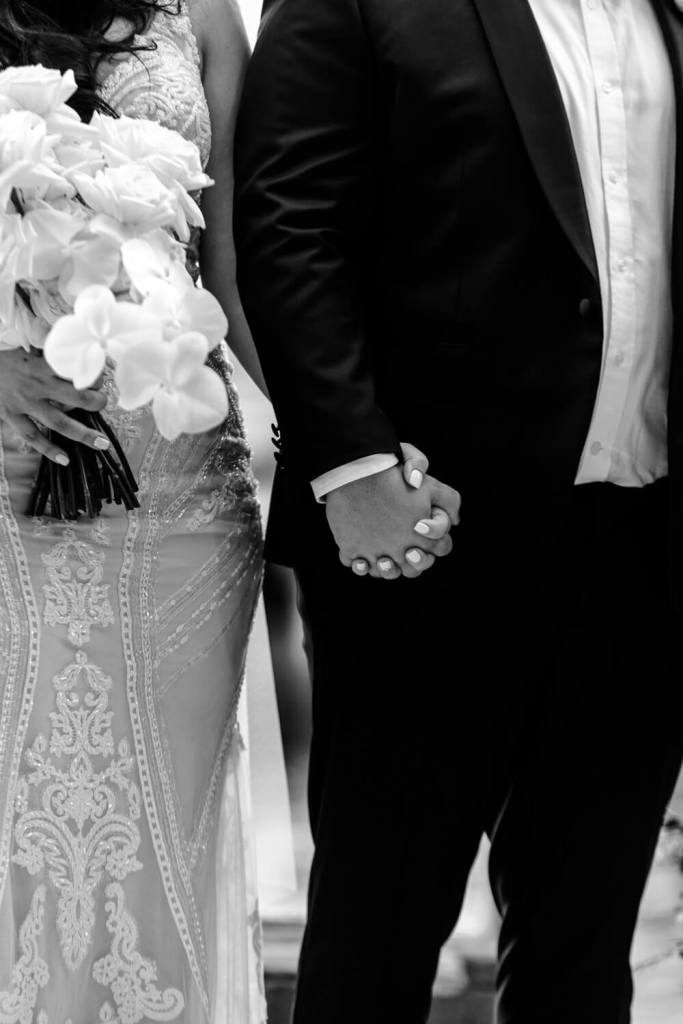 VIEW-BY-SYDNEY-PIER-ONE-WEDDING-PHOTOGRAPHER-ANELLOWEDDINGS-BRIDESMAIDS-CANDID-HOLDING-HANDS