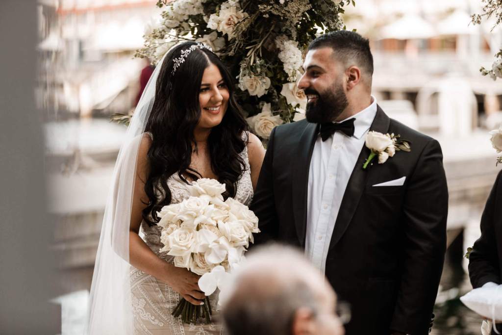VIEW-BY-SYDNEY-PIER-ONE-WEDDING-PHOTOGRAPHER-ANELLOWEDDINGS-SMILING-COUPLE