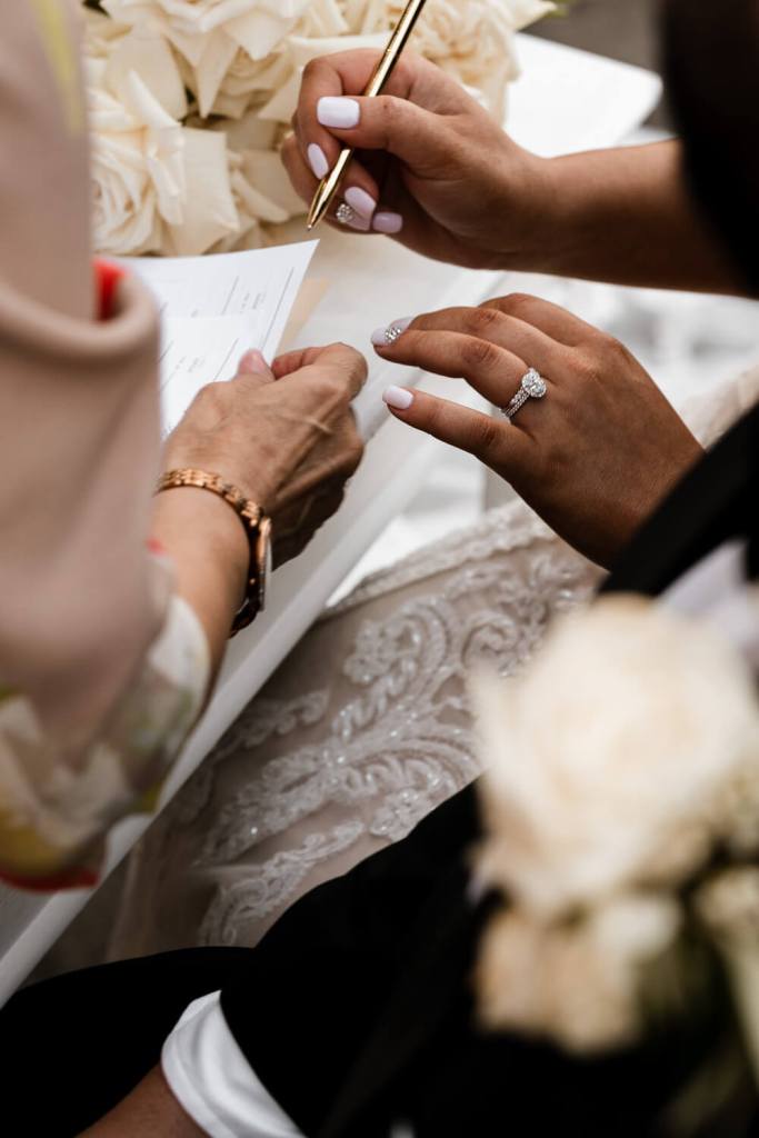 VIEW-BY-SYDNEY-PIER-ONE-WEDDING-PHOTOGRAPHER-ANELLOWEDDINGS-SIGNING-MARRIAGE-CERTIFICATE