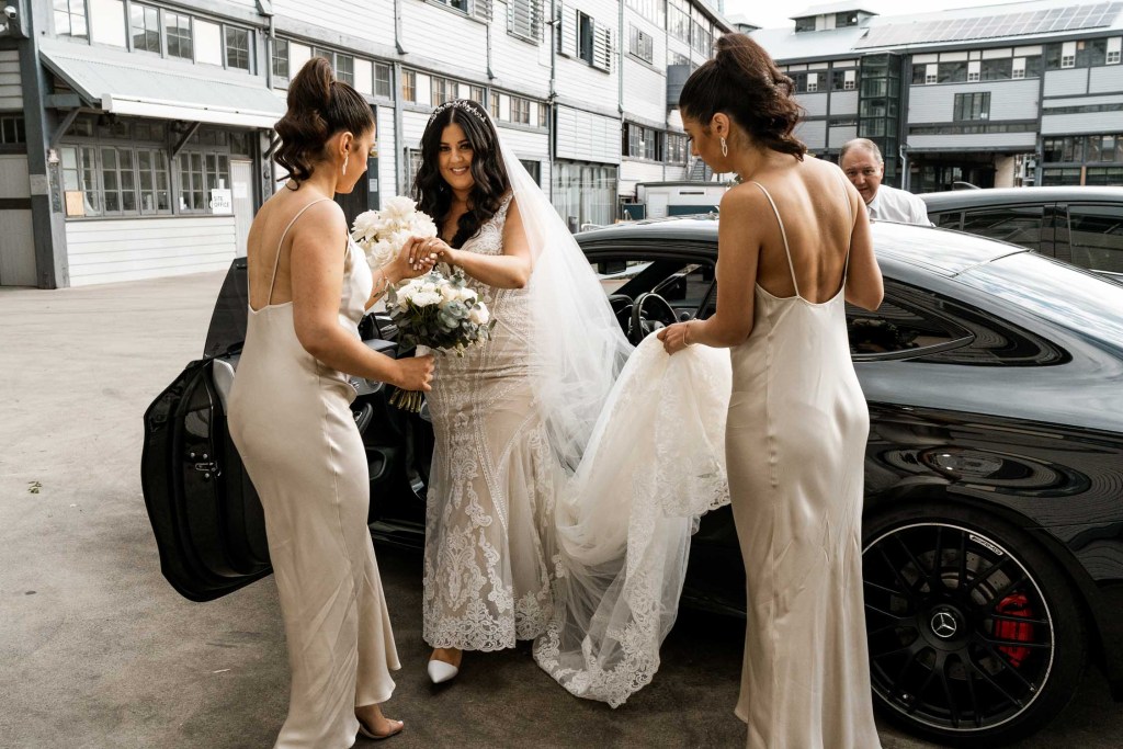 VIEW-BY-SYDNEY-PIER-ONE-WEDDING-PHOTOGRAPHER-ANELLOWEDDINGS-NERVOUS-BRIDE-EXITING-CAR