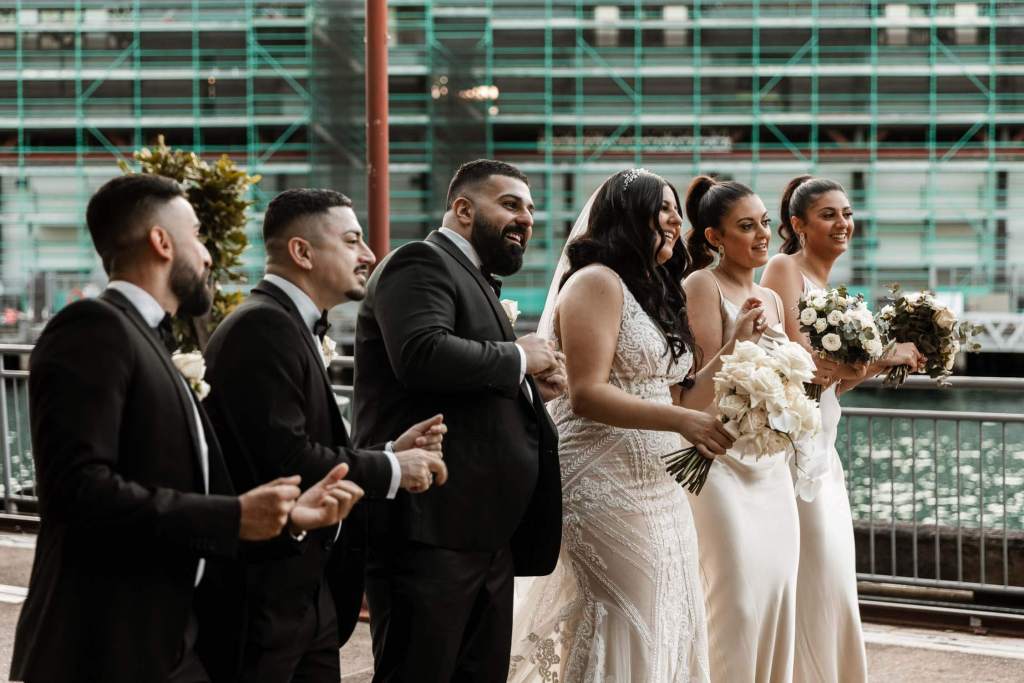 VIEW-BY-SYDNEY-PIER-ONE-WEDDING-PHOTOGRAPHER-ANELLOWEDDINGS-BRIDAL-PARTY-DANCE-FUN