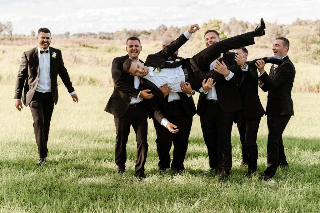 WESTERN-SYDNEY-PARKLANDS-THE-DAIRY-ABBOTSBURY-SYDNEY-PHOTOGRAPHERS-ANELLOWEDDINGS-THROWING-GROOM