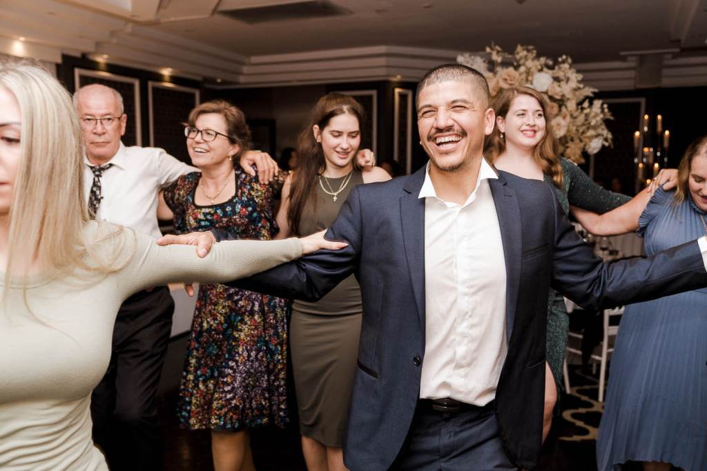 guest laughing on dancefloor