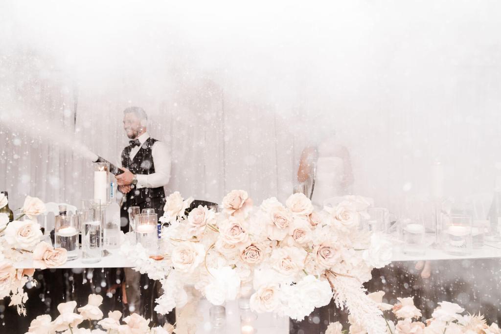 bride and groom use smoke guns