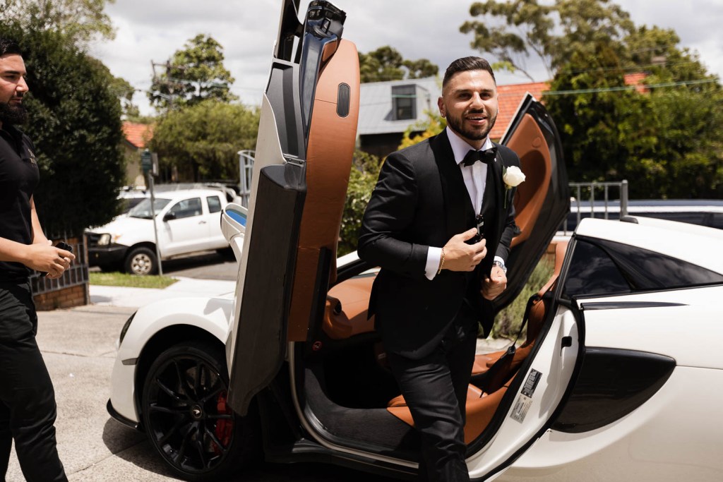 groom getting out of car