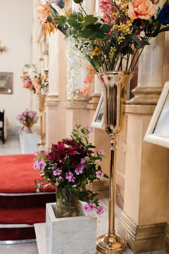 flowers at the front of church