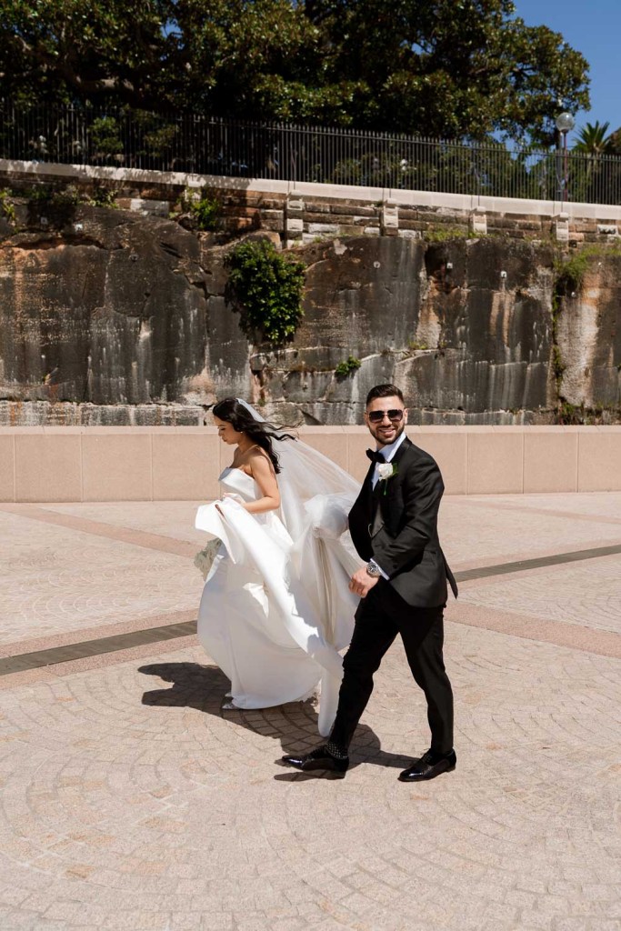 bride and groom waking