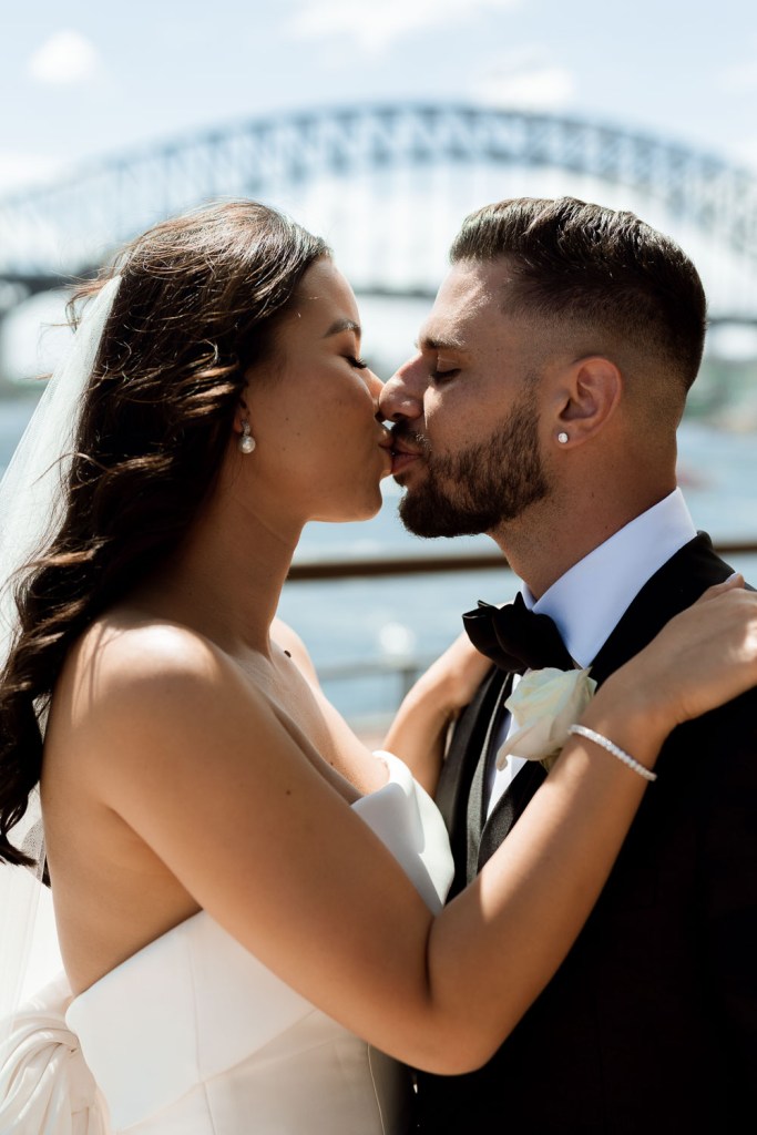 bride and groom kissing