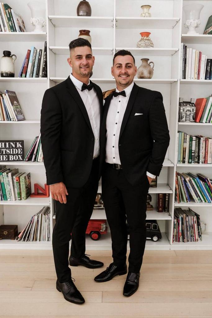 Groomsmen drinking at grooms