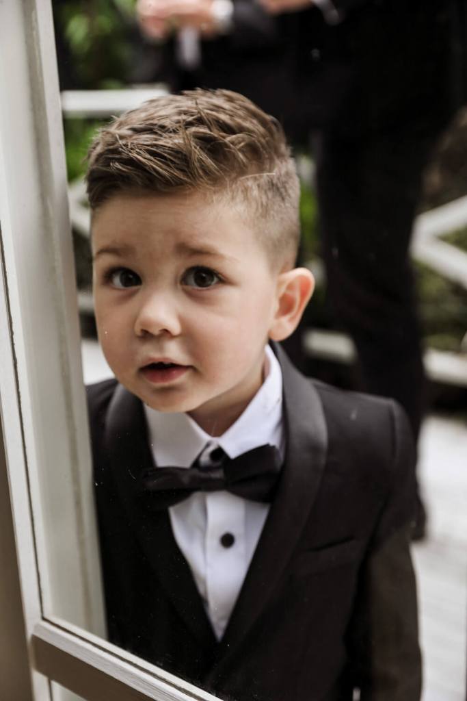 Young boy at grooms party