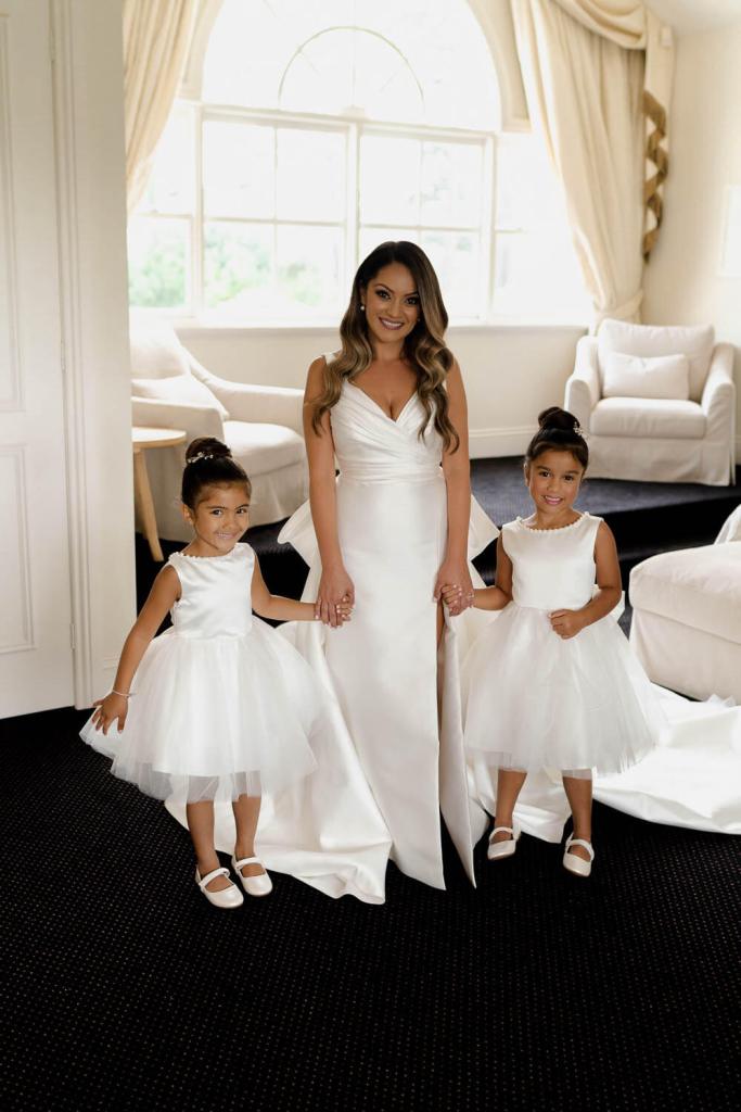Bride with flower girls Elle Zeitoune