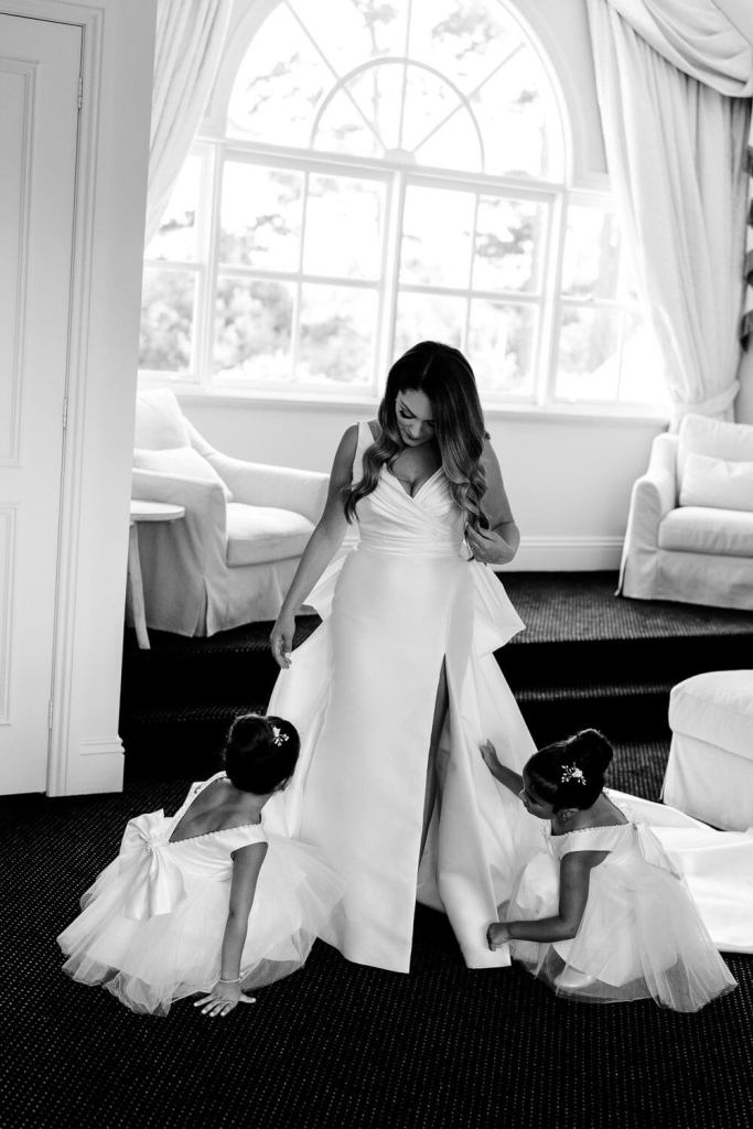 Bride with flower girls Elle Zeitoune