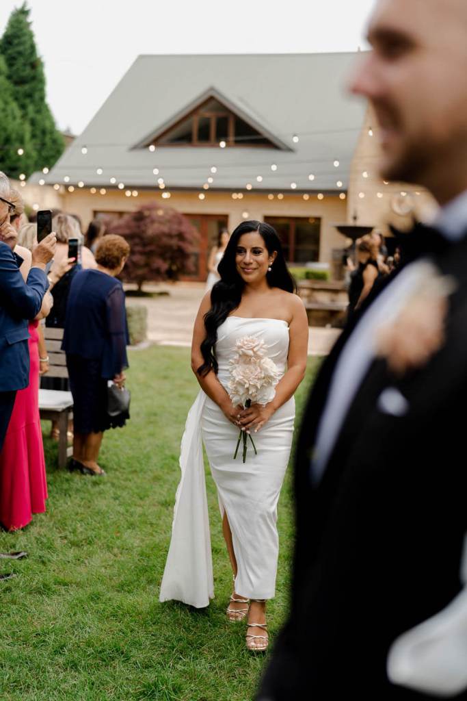 Bridesmaid walking down the aisle