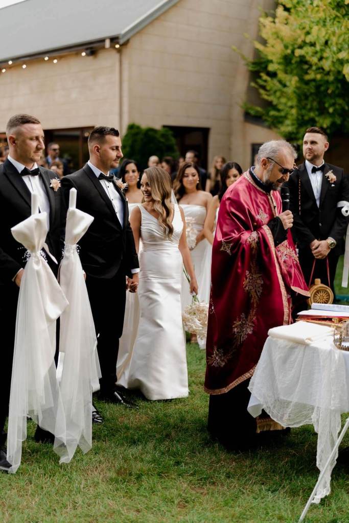 Bride and groom at alter Centennial Vineyards