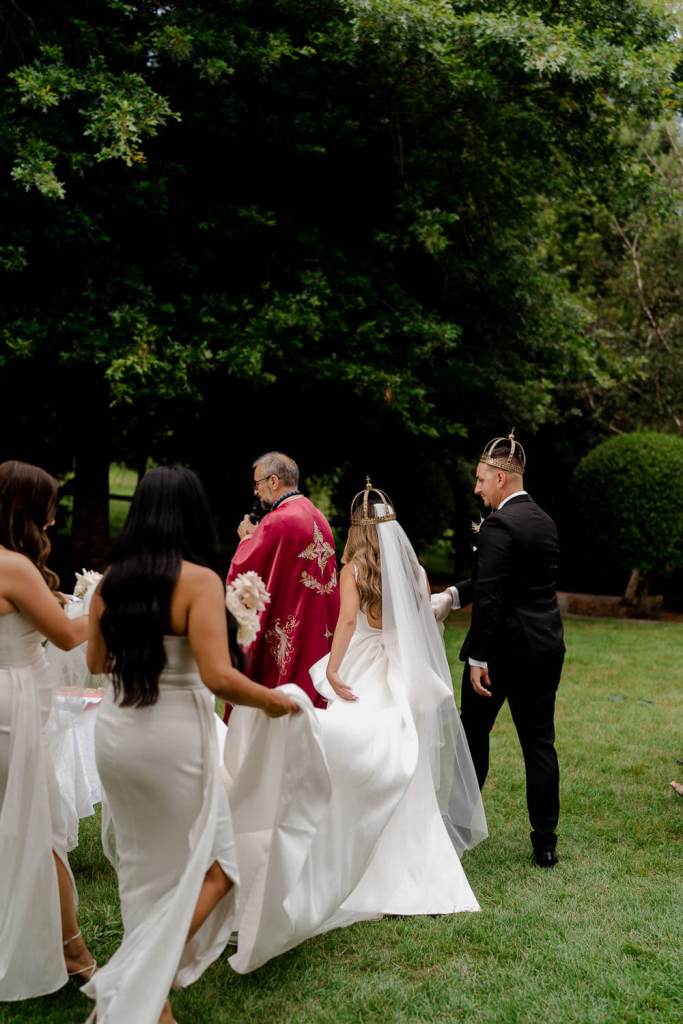 Bride and groom circle at church