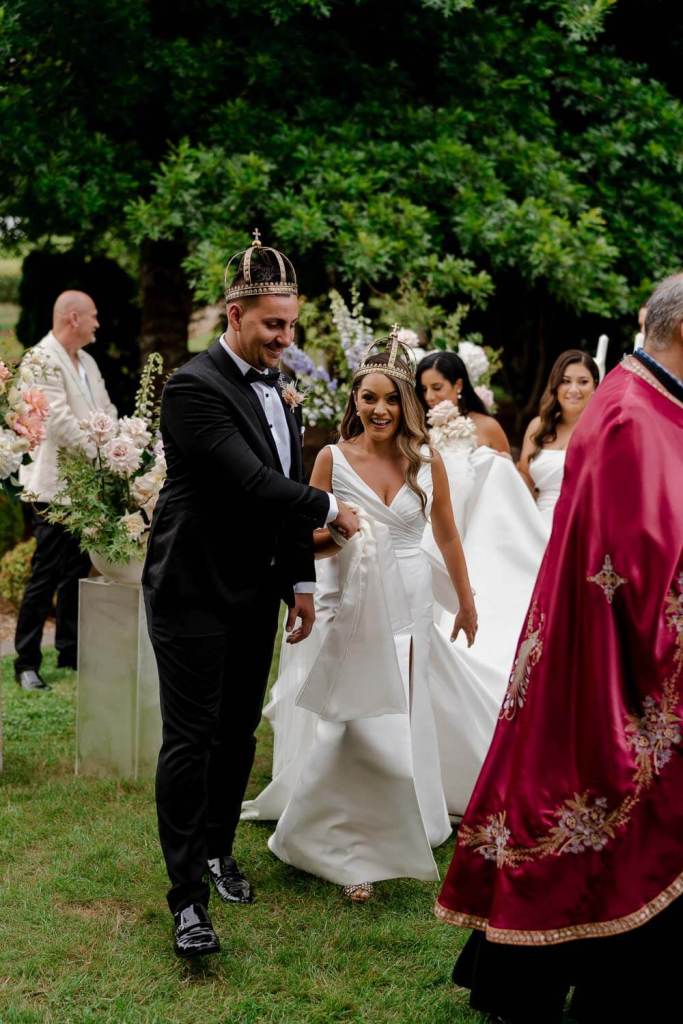 Bride and groom walking at church