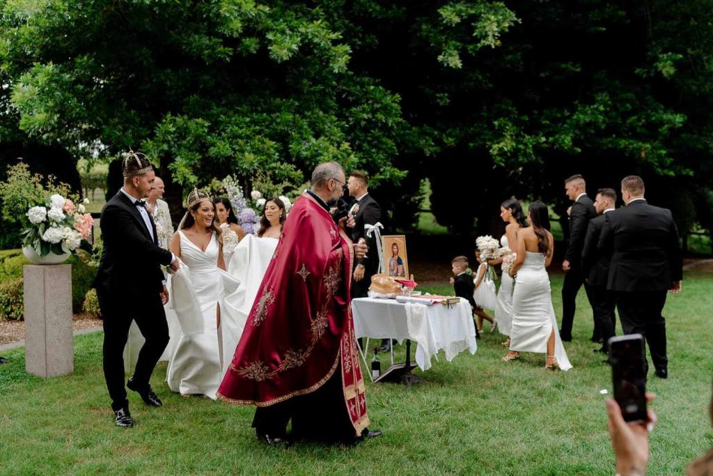 Bride and groom circle at church