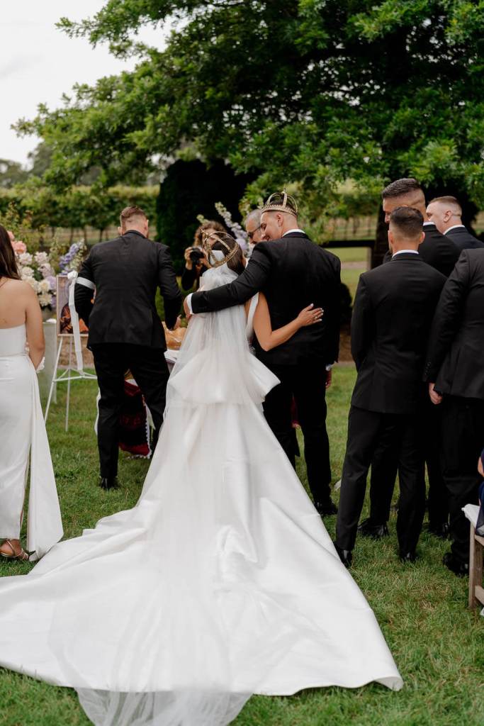 Bride and groom hugging