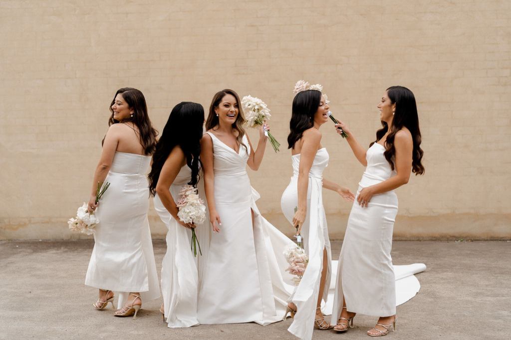 Bridesmaids laughing