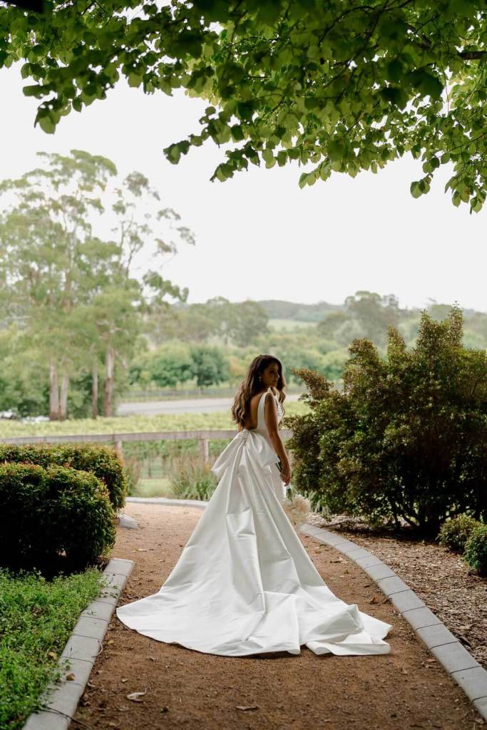 Bride smiling in garden