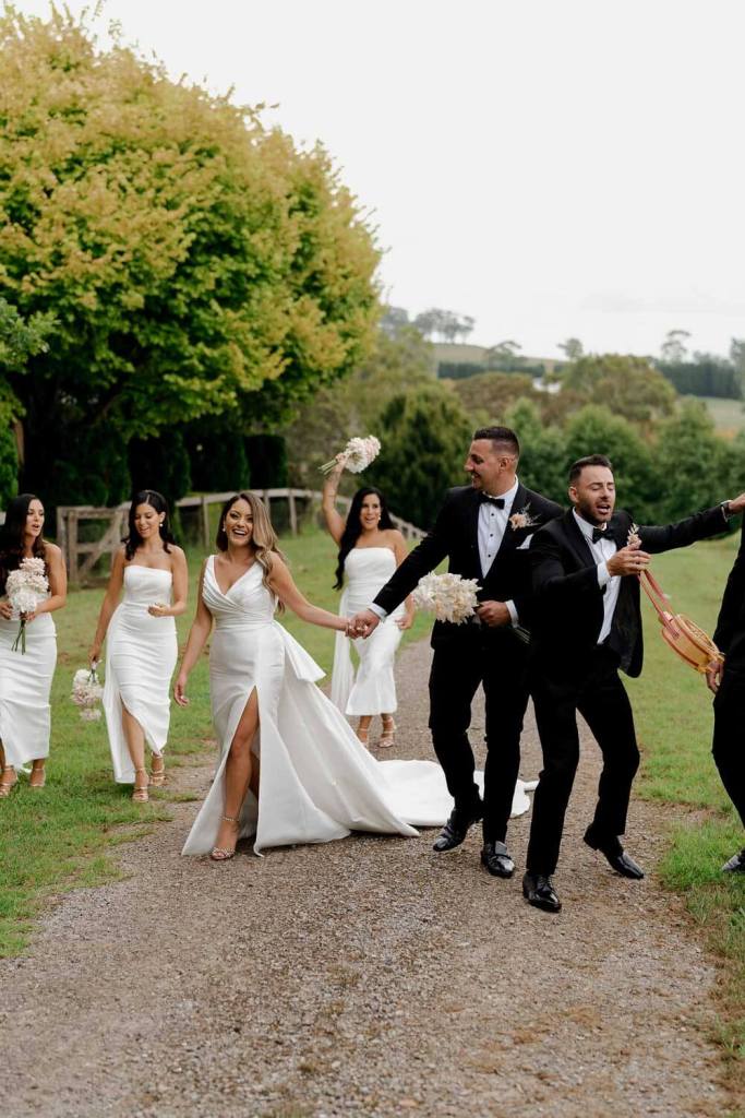 Bridal party dancing in Centennial Vineyards Bowral