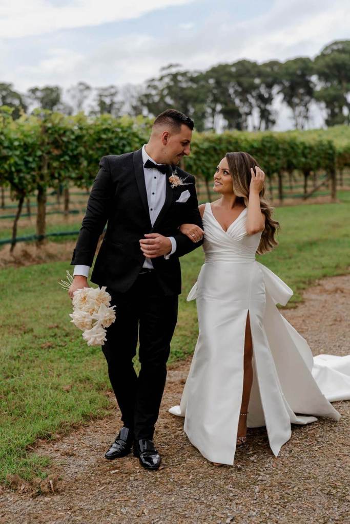 Couple walking in Centennial Vinyards Bowral
