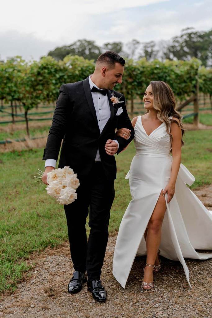 Couple walking in Centennial Vinyards Bowral