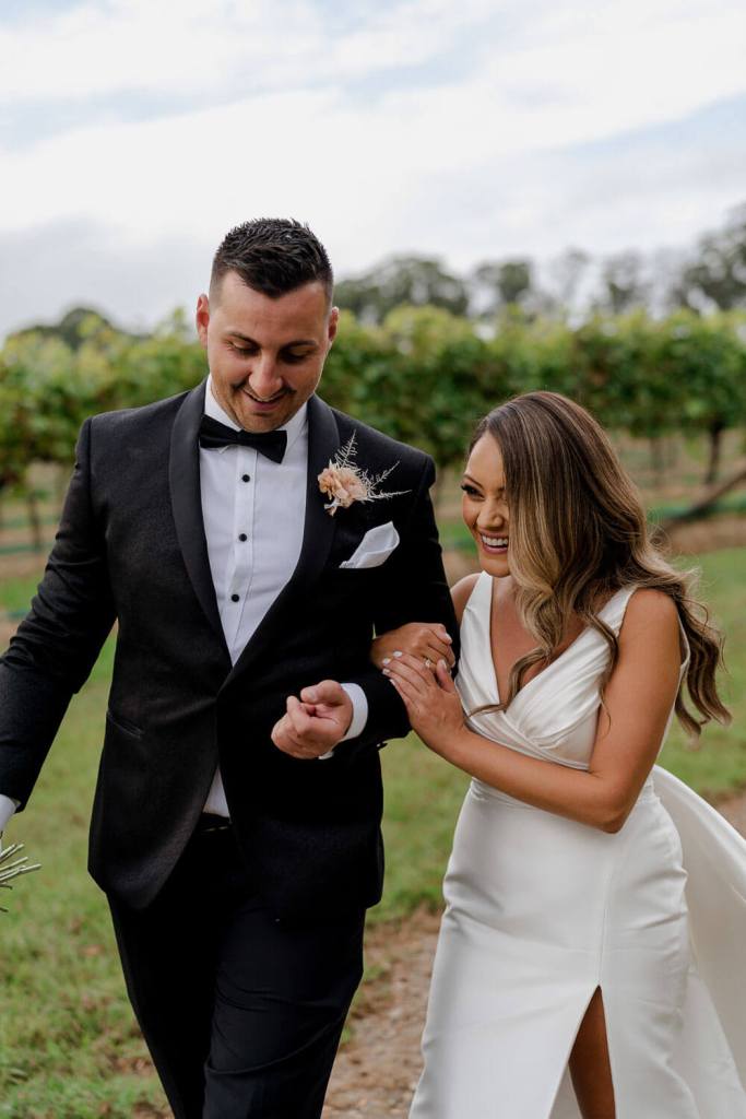 Couple laughing in Centennial Vinyards Bowral