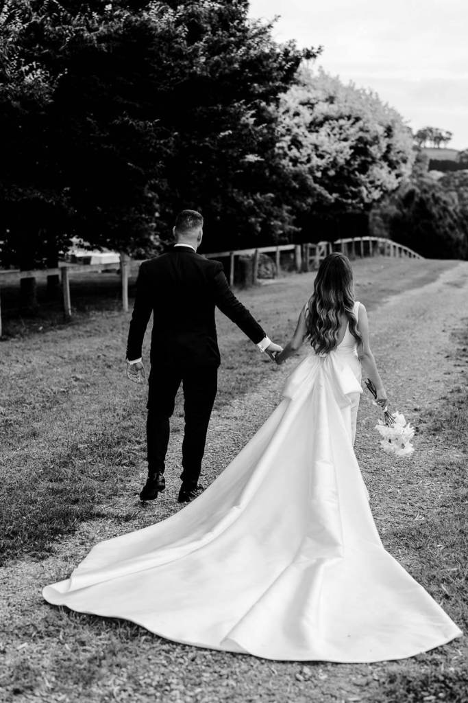 Bride and groom gazing in distance