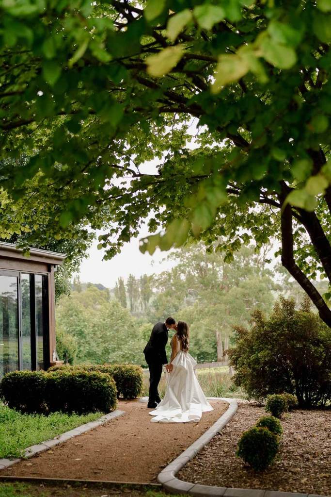 Bride and groom kissing