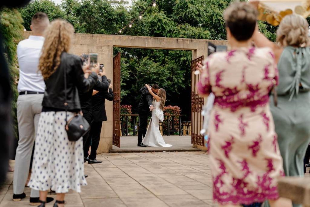 Bride and groom entrance dance and kiss